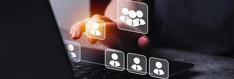 illustative image of a person seen doing a group message to his team members